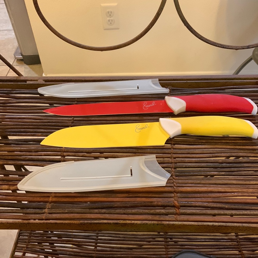 Emeril knives. 7”‎ Santoko yellow and 8” slicer red. With sleeve